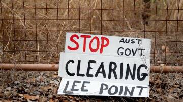Land clearing for defence housing at Lee Point, near Darwin, is continuing despite protests. (Esther Linder/AAP PHOTOS)