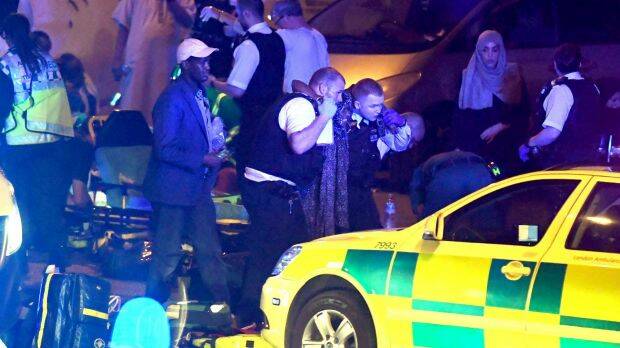 Police and paramedics at the scene of a crash in Finsbury Park in north London. Photo: James Gourley/Australscope