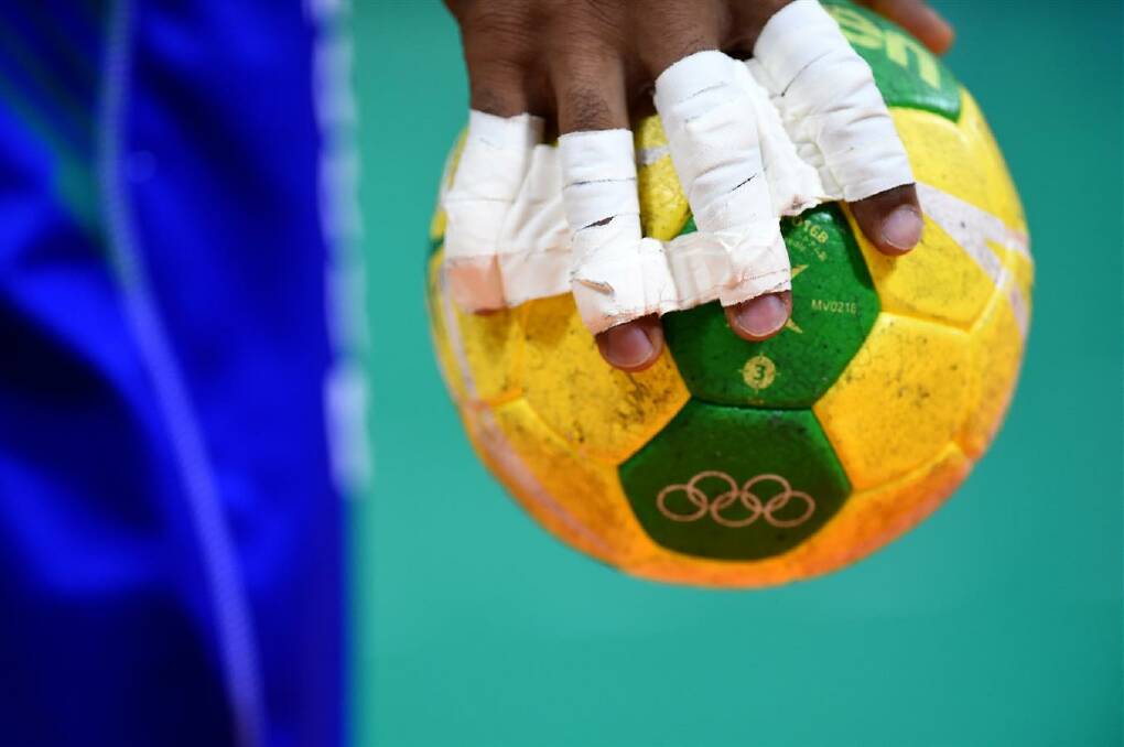 DAY 12: A detailed view of a ball is displayed during the Men's Quarterfinal Handball contest at Future Arena on Day 12 of the Rio 2016 Olympic Games on August 17, 2016 in Rio de Janeiro, Brazil. Photo: Laurence Griffiths/Getty Images