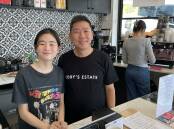 Robert Eng and daughter Ellie in their cafe at Jannali. Picture by Murray Trembath