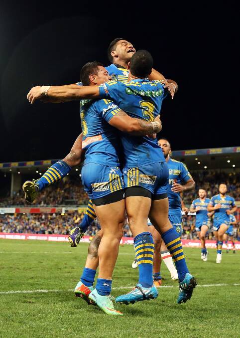 You beauty: Eels celebrate after defeating the Roosters at Pirtek Stadium. Picture: Getty Images