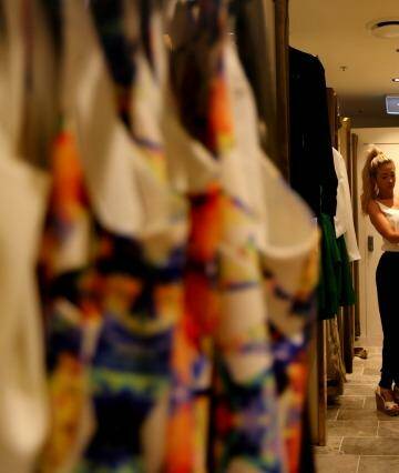 Size matters: Mez Gallifuoco tries a size 10 Dawn Midi dress at Seduce  in  Sydney's Eastgardens shopping centre. Photo: Kate Geraghty