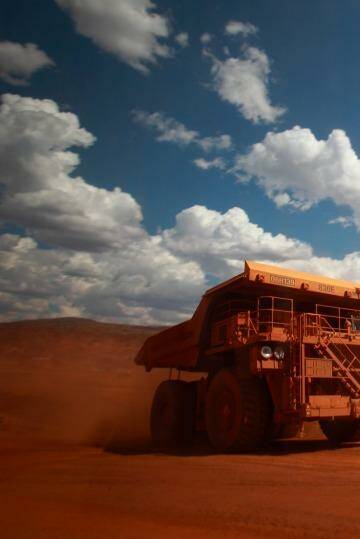 Iron ore prices remain in mid-correction,    says UBS. Photo: Louie Douvis
