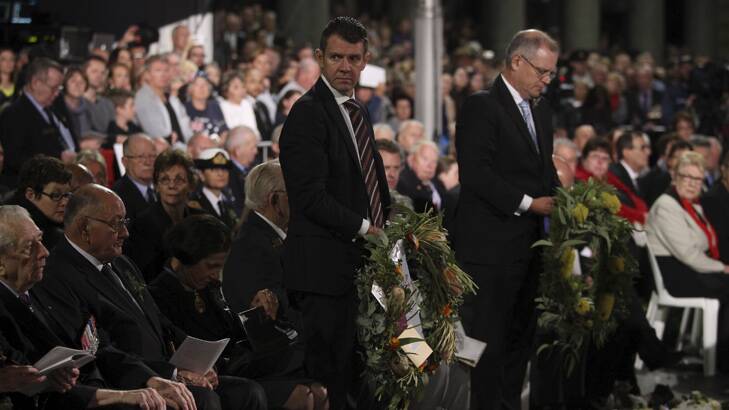NSW Premier Mike Baird and federal Immigration Minister Scott Morrison prepare to lay wreaths at the Anzac Day Dawn Service in Sydney. Photo: Nick Moir