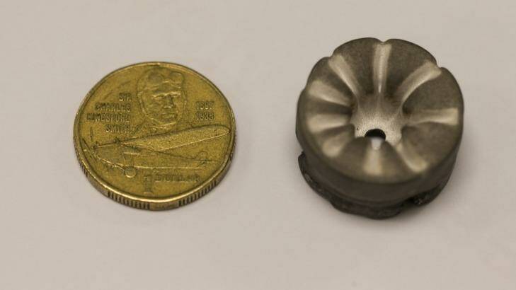 One of the 2.5 centimetre diameter magnesium cathodes (right) from Dr Neumann's ion drive after use. Photo: Edwina Pickles