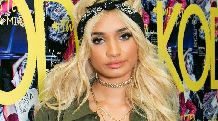A teenage paparazzi has defended wishing a death threat on US singer Pia Mia when she refused to stop for a picture in Sydney. Photo: Gabriel Olsen