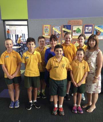 Principal Elaine Wilson and assistant principal Marg Roberts gather with students from Wattleview Primary School in the new classrooms. 