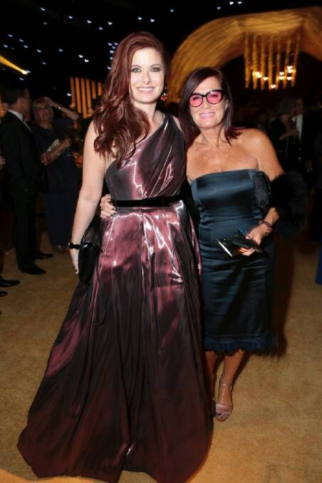 Debra Messing, left, attends the Governors Ball for the 69th Primetime Emmy Awards at the Los Angeles Convention Center on Sunday, Sept. 17, 2017, in Los Angeles. (Photo by Alex Berliner/Invision for the Television Academy/AP Images)
