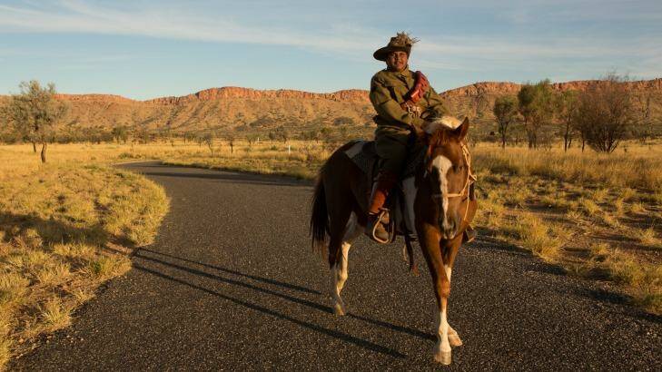 Stanley Kenny, 14, on his paint pony Allan, in the uniform of the Australian Light Horse, at the outskirts of Alice Springs before he rides into the centre of Australia as part of the 100th anniversary commemorations of the landing at Anzac Cove.