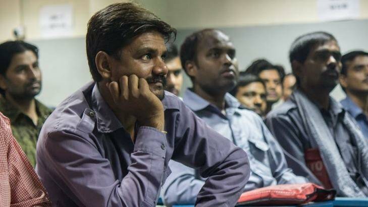 Auto-rickshaw drivers listen during a gender training session at Ashok Leyland Driver Training Institute in north Delhi. Photo: Alys Francis