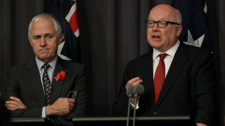 Communications Minister Malcolm Turnbull and Attorney-General George Brandis brief the media on the new legislation on Thursday. Photo: Alex Ellinghausen