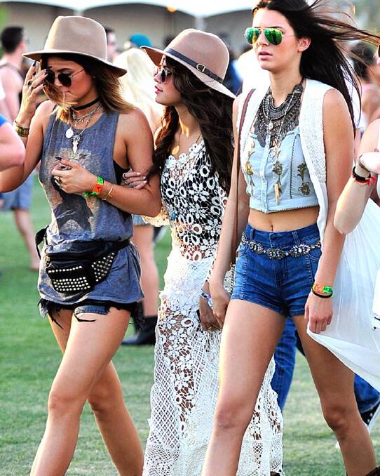 Kylie Jenner, Selena Gomez and Kendall Jenner walking through the crowd at Coachella. Photo: eonline.com