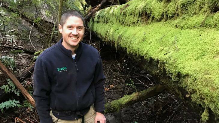 The smile says it all. Deon Gilbert at the Mount Baw Baw site where he found the first female Baw Baw frog in October. Photo: Zoos Victoria