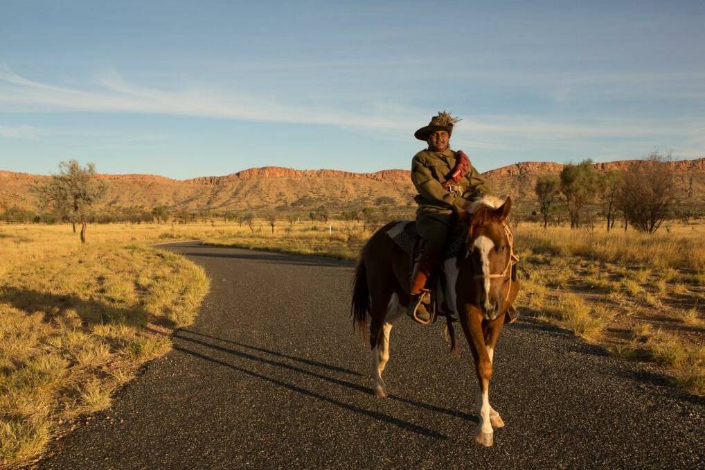 Stanley Kenny, 14, on his paint pony Allan, in the uniform of the Australian Light Horse, at the outskirts of Alice Springs before he rides into the centre of Australia as part of the 100th anniversary commemorations of the landing at Anzac Cove.