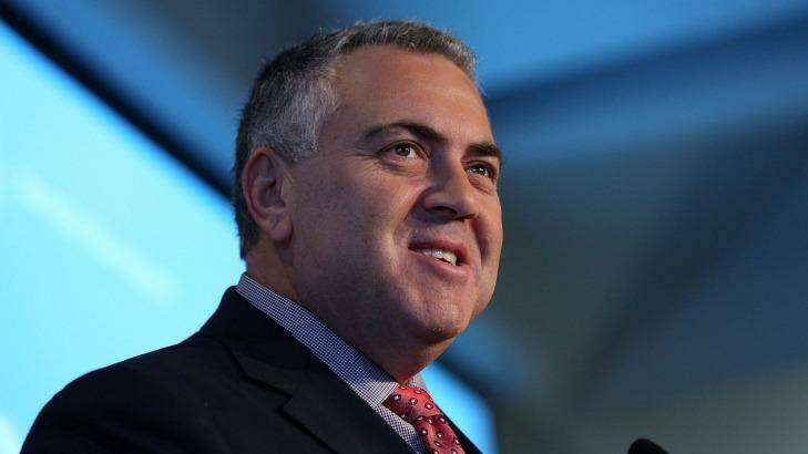 Treasurer Joe Hockey has to decide what should be tax-exempt what should not be taxed. Photo: Graham Denholm