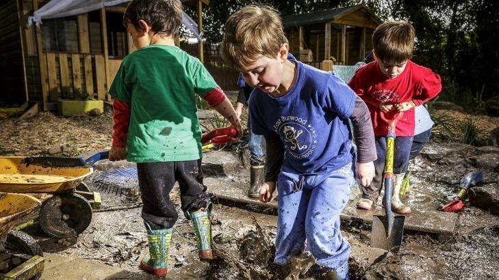 Fun in the mud at East Burwood Preschool. Photo: Daniel Pockett