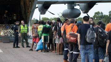 The ADF has been called in to evacuate locals from Borroloola in the NT after widespread flooding. (HANDOUT/AUSTRALIAN DEFENCE FORCE)