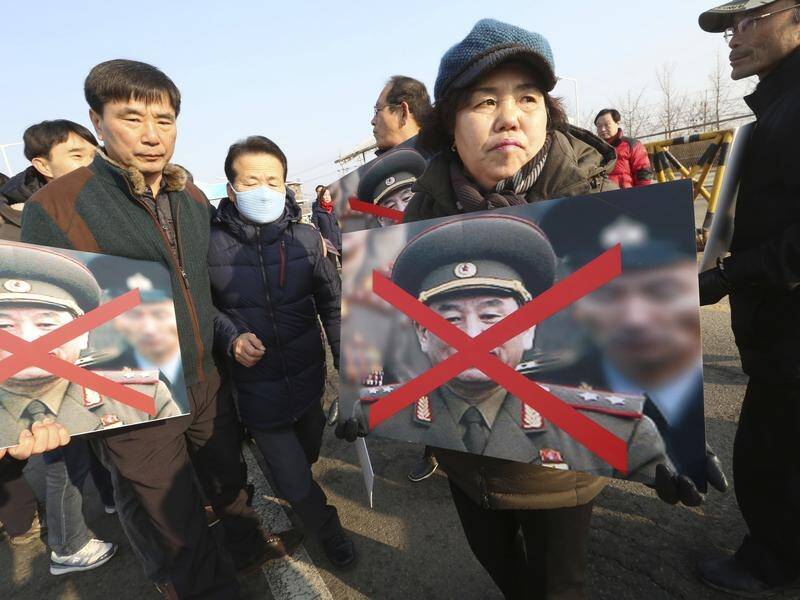 Protests have been held against North Korea's Kim Yong Chol attending the Winter Games close.