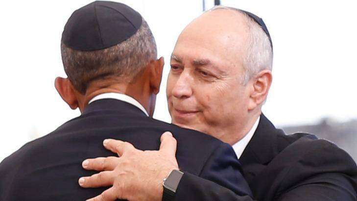 Chemi Peres, son of former Irsaeli President Shimon Peres, hugs US President Barack Obama during the funeral. Photo: ARIEL SCHALIT