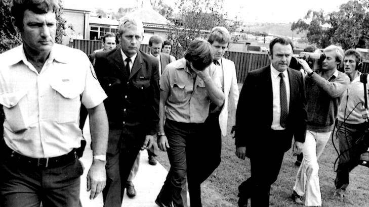 Police escorting Boyd to Campbelltown Police station in April, 1983. Photo: Trevor Dallen