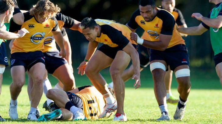 "As a young kid I always wanted to play in those big games": Israel Folau (centre) training with Michael Hooper and Wycliff Palu. Photo: Wolter Peters