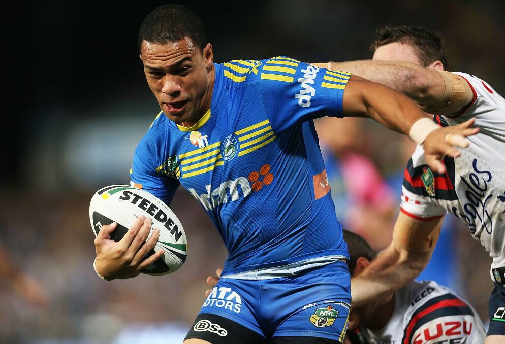 SYDNEY, AUSTRALIA - APRIL 12: Will Hopoate of the Eels is tackled during the round 6 NRL match between the Parramatta Eels and the Sydney Roosters at Pirtek Stadium on April 12, 2014 in Sydney, Australia. (Photo by Mark Metcalfe/Getty Images)
