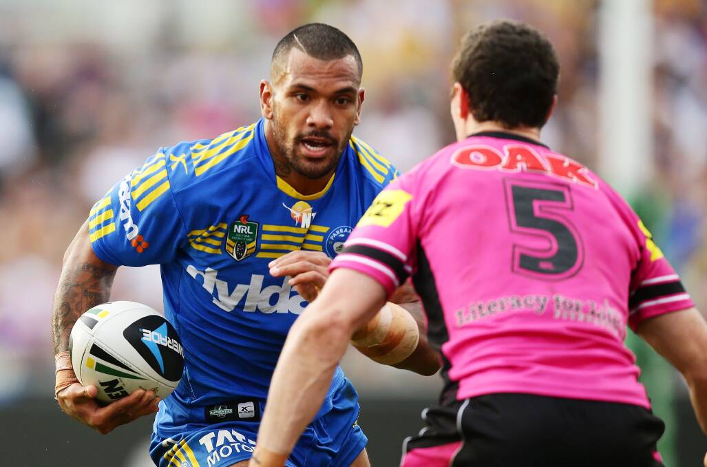 SYDNEY, AUSTRALIA - MARCH 29: Manu Ma'u of the Eels runs at David Simmons of the Panthers during the round four NRL match between the Parramatta Eels and the Penrith Panthers at Pirtek Stadium on March 29, 2014 in Sydney, Australia. (Photo by Matt King/Getty Images)