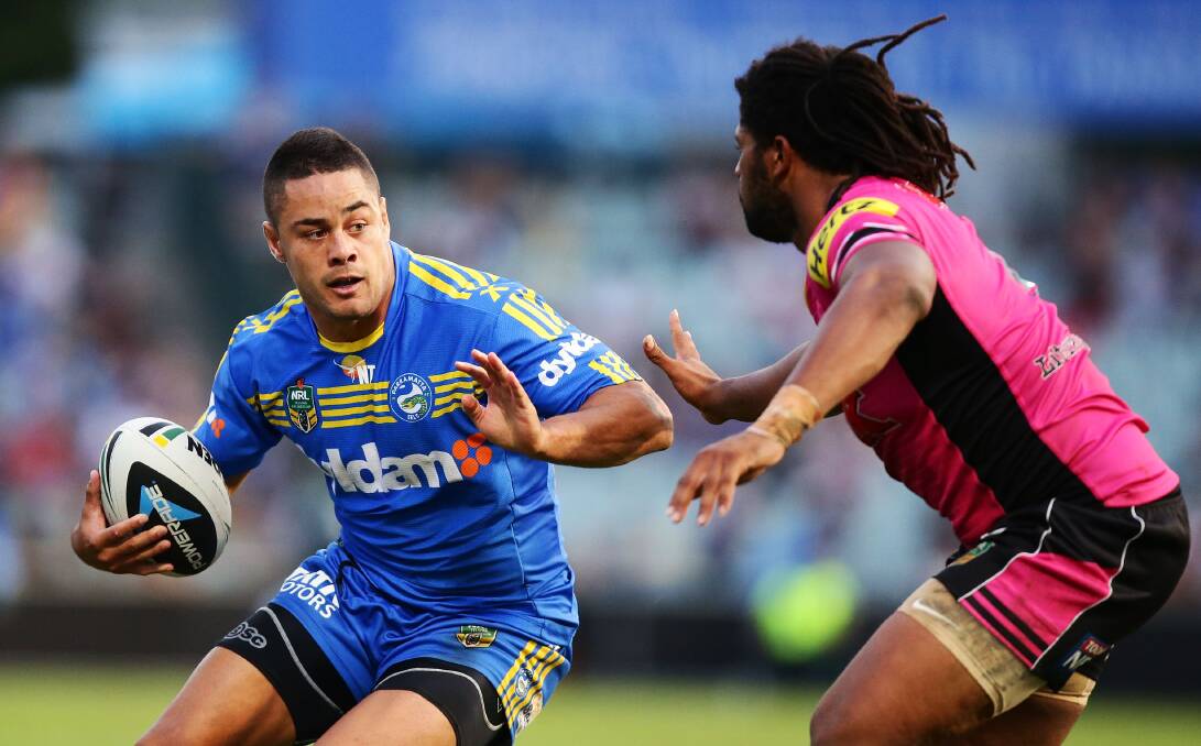 SYDNEY, AUSTRALIA - MARCH 29: Jarryd Hayne of the Eels runs at Jamal Idris of the Panthers during the round four NRL match between the Parramatta Eels and the Penrith Panthers at Pirtek Stadium on March 29, 2014 in Sydney, Australia. (Photo by Matt King/Getty Images)