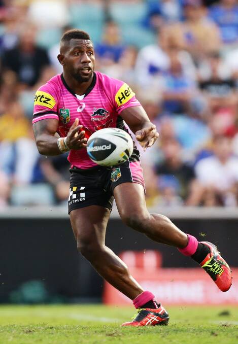 SYDNEY, AUSTRALIA - MARCH 29: James Segeyaro of the Panthers passes during the round four NRL match between the Parramatta Eels and the Penrith Panthers at Pirtek Stadium on March 29, 2014 in Sydney, Australia. (Photo by Matt King/Getty Images)