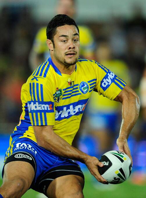 TOWNSVILLE, AUSTRALIA - APRIL 26: Jarryd Hayne of the Eels looks to pass the ball during the round 8 NRL match between the North Queensland Cowboys and the Parramatta Eels at 1300SMILES Stadium on April 26, 2014 in Townsville, Australia. (Photo by Ian Hitchcock/Getty Images)