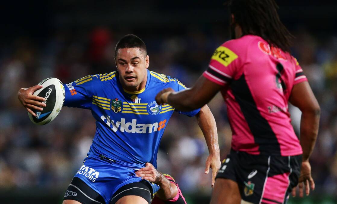 SYDNEY, AUSTRALIA - MARCH 29: Jarryd Hayne of the Eels takes on the defence during the round four NRL match between the Parramatta Eels and the Penrith Panthers at Pirtek Stadium on March 29, 2014 in Sydney, Australia. (Photo by Matt King/Getty Images)