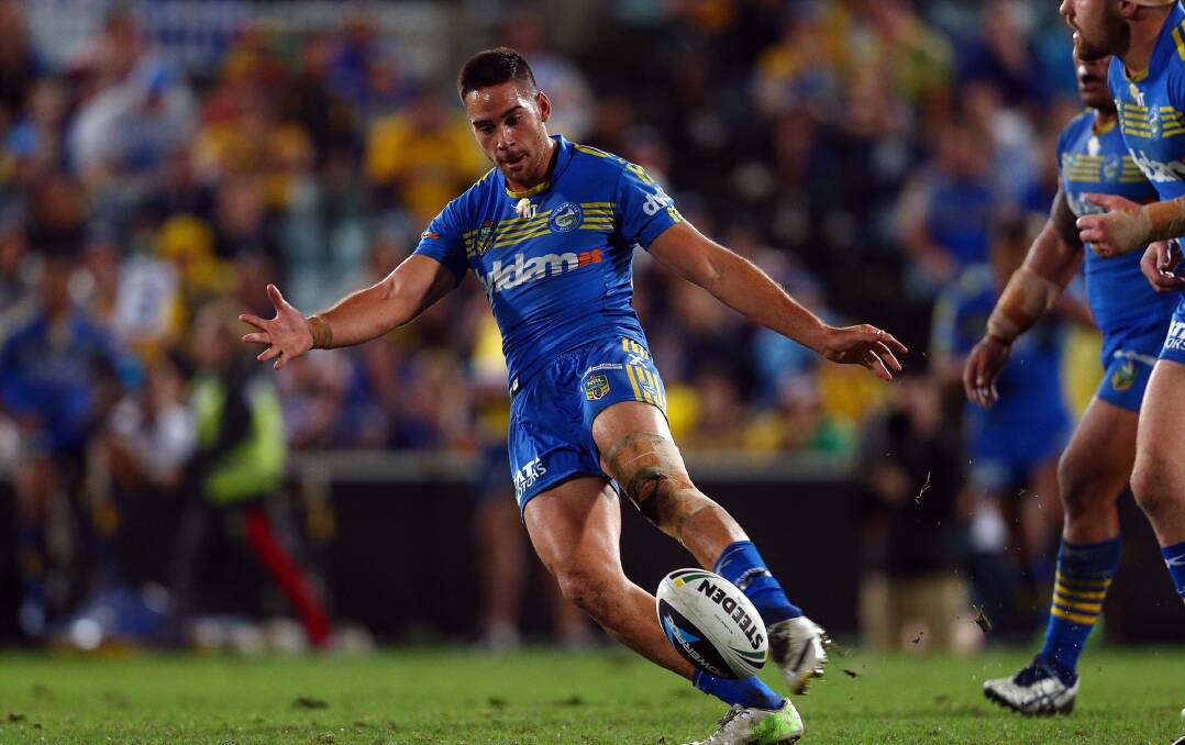 SYDNEY, AUSTRALIA - APRIL 12: Corey Norman of the Eels kicks ahead during the round 6 NRL match between the Parramatta Eels and the Sydney Roosters at Pirtek Stadium on April 12, 2014 in Sydney, Australia. (Photo by Renee McKay/Getty Images)