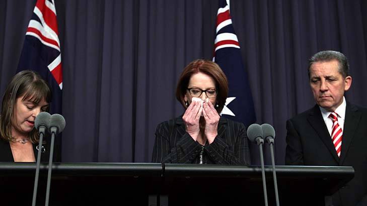 Emotional announcement ...  Prime Minister Julia Gillard, centre, with outgoing senators Nicola Roxon and Chris Evans.