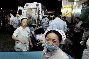 A worker arrives at hospital after the explosion at the Apple factory in China.