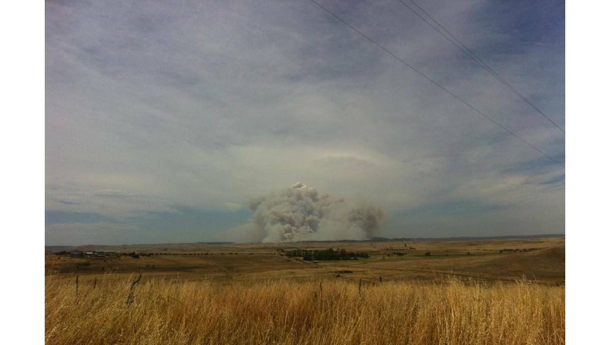 Smoke from the Yarrabin fire as seen from Cooma. Photo: ARISTOPHANIA/TWITTER