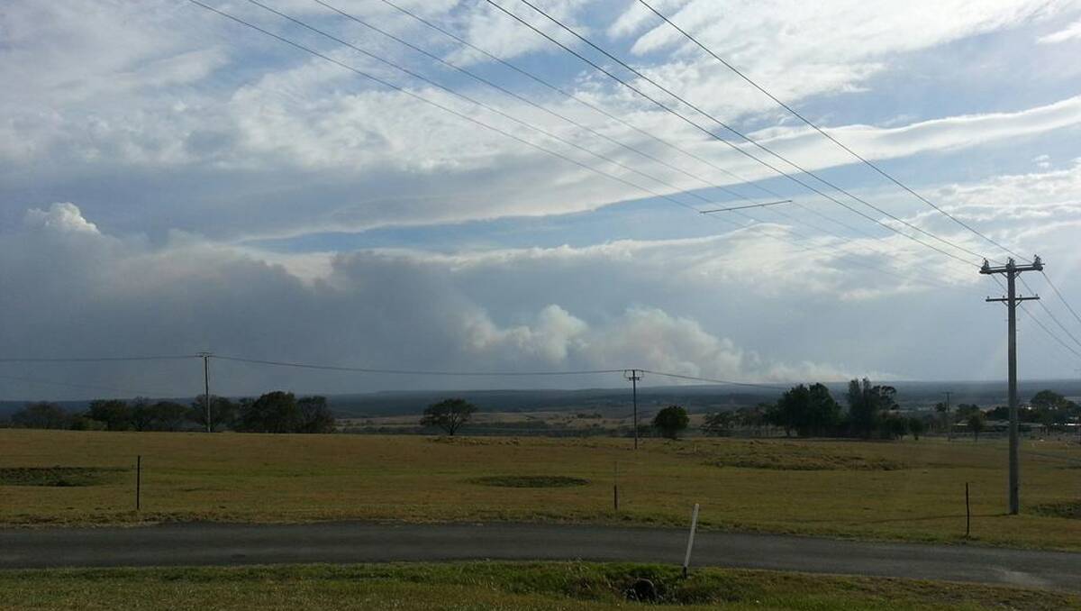 View from Nowra hill looking south toward the fires. Photo: robertb1982/Twitter. 