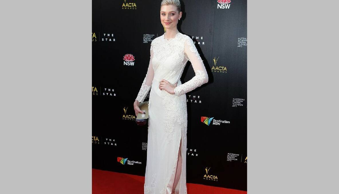 Elizabeth Debicki wears Thurley, Tiffany & Co and a Tan & Brown clutch at the AACTA Awards in Sydney. Photo: Dallas Kilponen