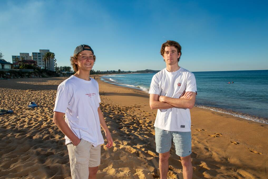TO THE RESCUE: Oscar Hugill (L) and Liam Doughty (R) are being hailed as heroes by the local community after they assisted a man and his son on Narrabeen beach. Photo: Geoff Jones