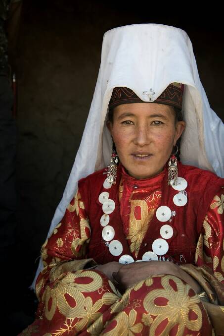In the Pamir, married Kyrgyz women pin long white veils to their hats. Pic: Marta Pascual Juanola.