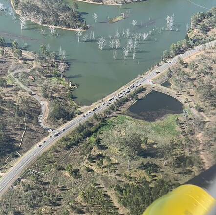 CHOPPER: A still from the Toowoomba helicopter as it approaches the crash scene at Wyaralong.