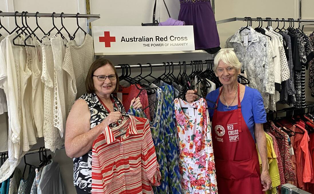 Australian Red Cross Dubbo store manager Julie Warren (left) and volunteer Ros Gable. With stores inundated with goods, it's a good time to go shopping to help clear the backlog. Photo: TOM BARBER