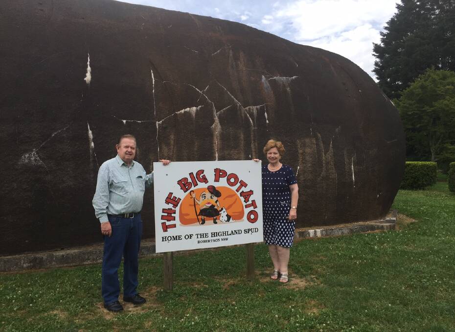 STARCH FOR SALE: Current potato-land owners Heather and Neil Tait with the Big Potato, now up for sale! Photo: Michelle Thomas. 