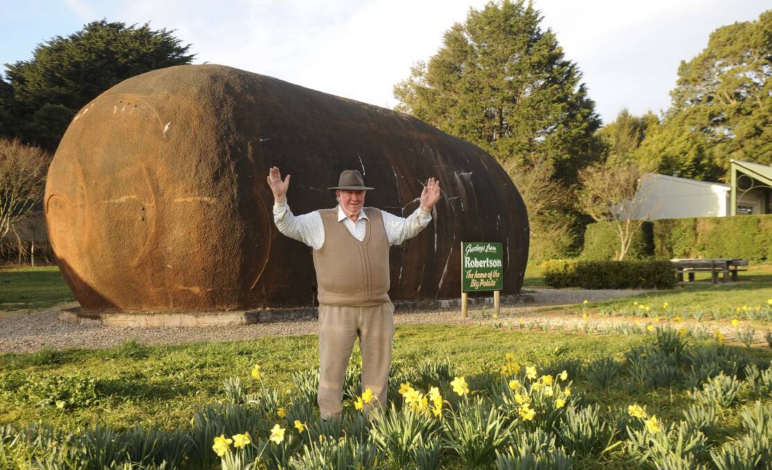 Big Potato builder Jim Mauger with the iconic landmark. 