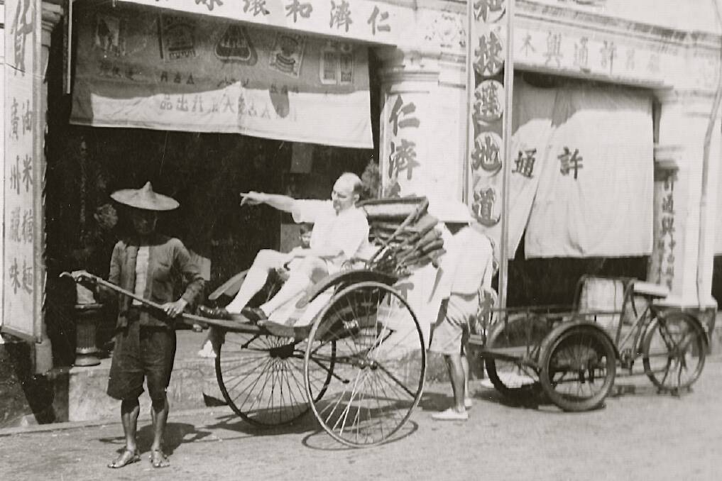 MYSTERY: Jim Pearson on a rickshaw in Singapore in 1941. Picture: Supplied by Patricia Taylor