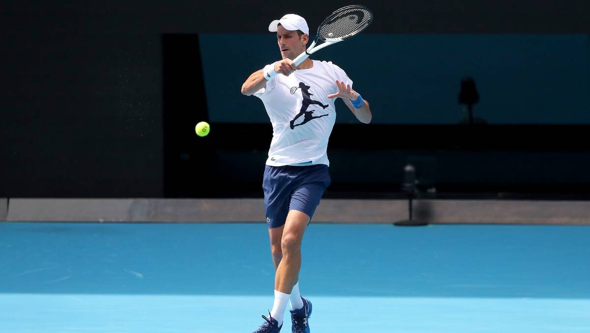 Novak Djokovic practices on Rod Laver Arena ahead of the 2022 Australian Open, at Melbourne Park on January 11. Picture: Getty Images