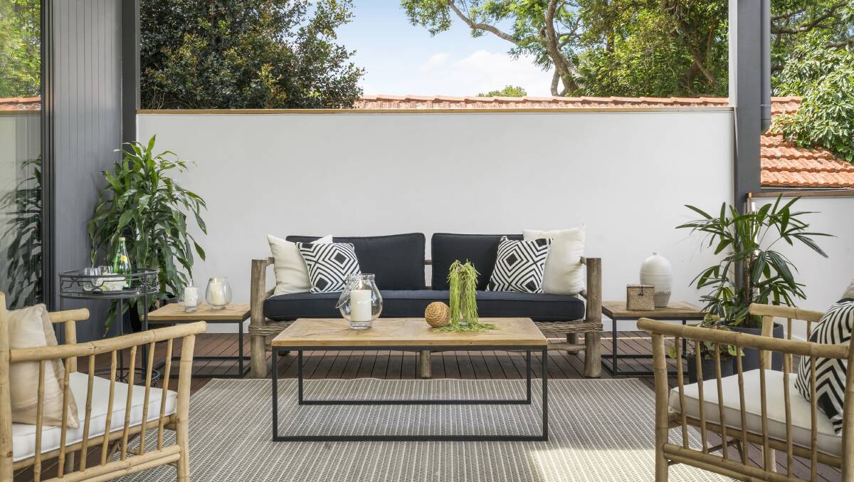 CHIC: Opt for roomy modular sofas with accompanying coffee tables and statement armchairs. Photo: Cordony Designs
