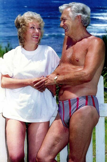 Casual: The memorable photo of couple Blanche d'Alpuget and Bob Hawke taken by Mercury photographer Orlando Chiodo on the South Coast on New Year's Eve in 1994.