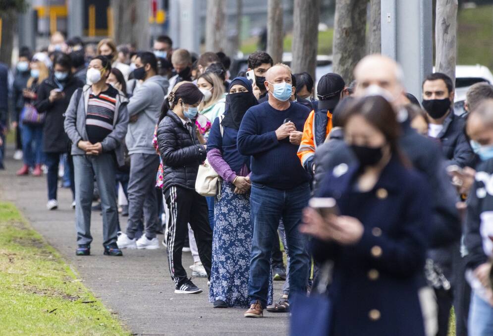 Long queues of people lining up for a vaccine in Sydney this week. Picture: Getty Images