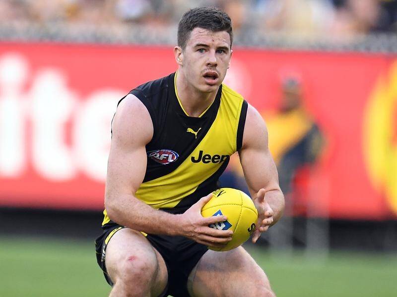 Richmond star Jack Higgins is in hospital where he has been diagnosed with bleeding on his brain.