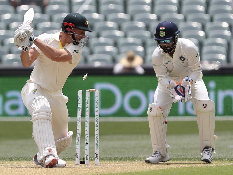 Shaun Marsh drags the ball onto his stumps for just two against India at Adelaide Oval.